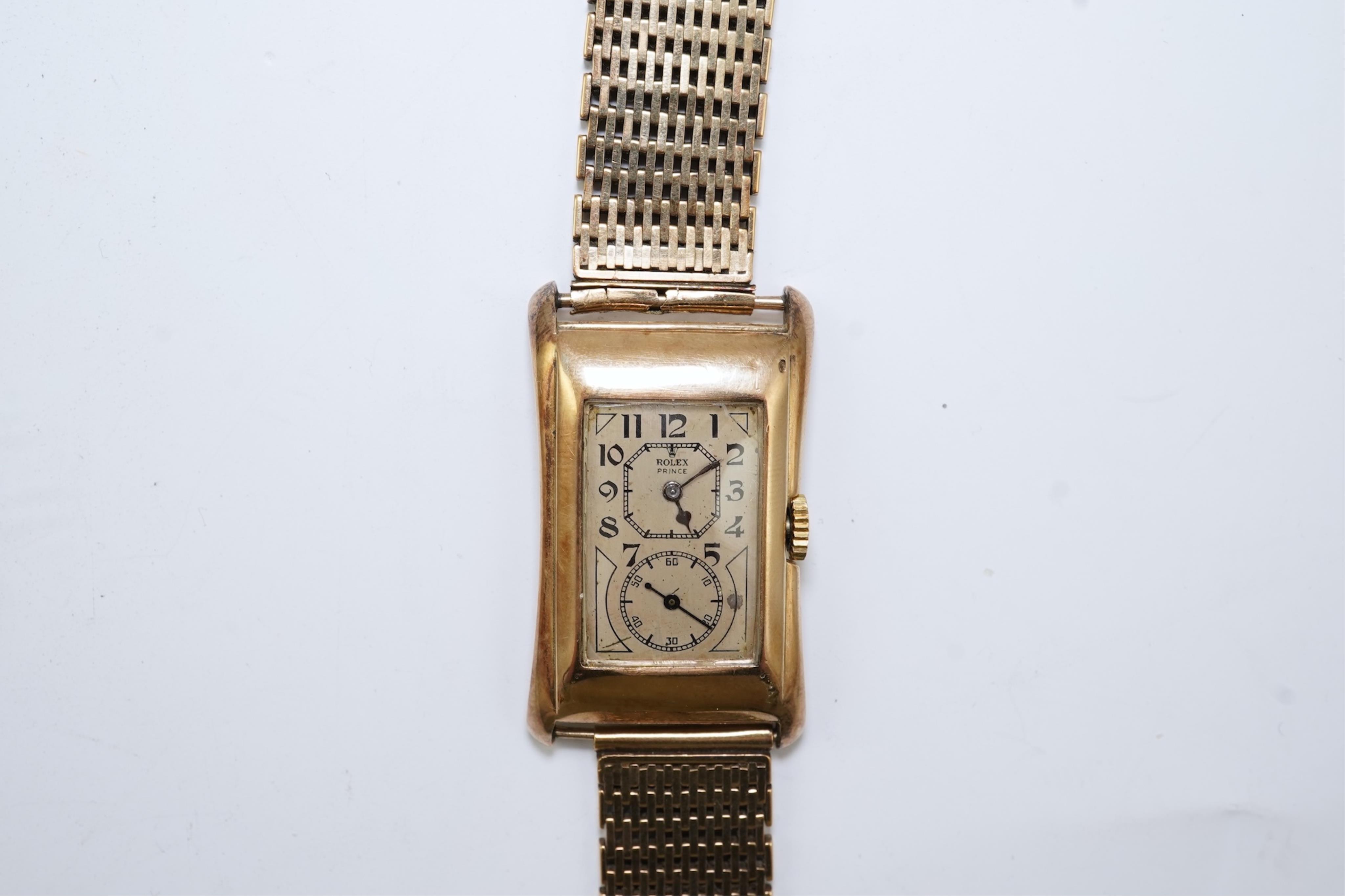 A gentleman's 1930's Rolex Prince manual wind wrist watch, on a later associated 9ct gold bracelet